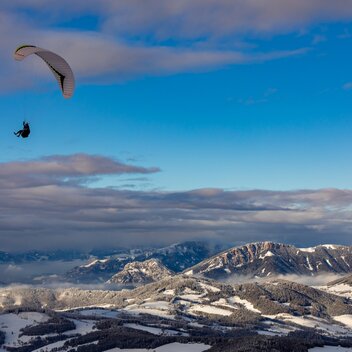 Paragleiten im Winter | © Region Graz | Harry Schiffer