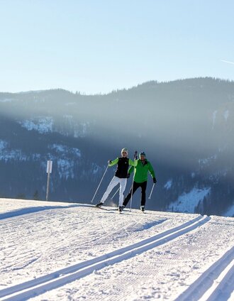 Langlaufen bei sonnigem Wetter | Tom Lamm | © Tourismusverband  Ausseerland Salzkammergut