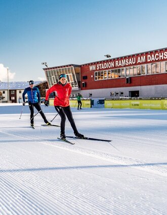 Zwei Langläufer im WM-Stadion Ramsau am Dachstein | Christine Höflehner | © Erlebnisregion Schladming-Dachstein
