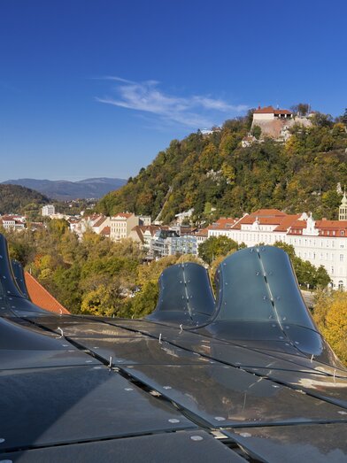 Graz with Kunsthaus and Schlossberg together with Clock Tower and Mariahilfer Church | © Steiermark Tourismus | Harry Schiffer