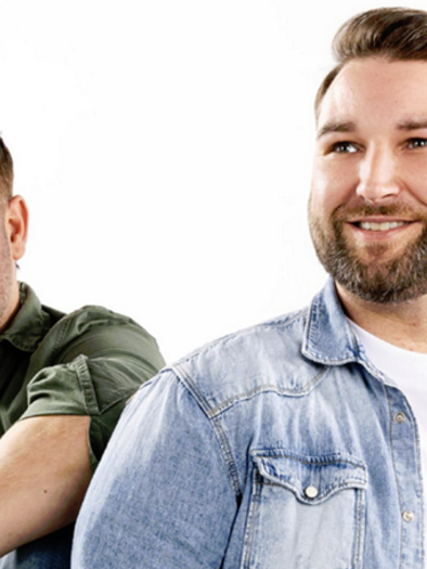 Two men are standing next to each other and smiling. They are wearing casual clothing and have a friendly expression. | © Bruno Bounty Photography