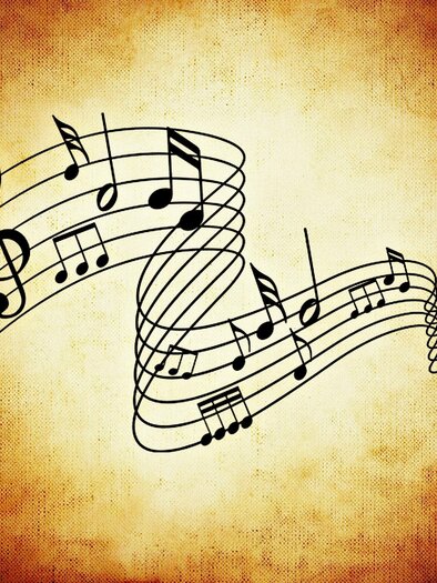 A musical sheet with lively staff lines on a warm, textured background. The notes symbolize creativity and music.