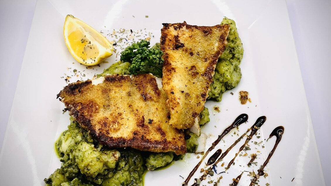 Zanderfilet mit Kartoffelgnocchi und Pesto | © Hotel-Restaurant Schwarzer Adler