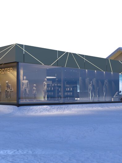 A modern building in the snow with large glass windows and a green roof. The surroundings are wintry with snow-covered trees. | © Intersport Gerhardter