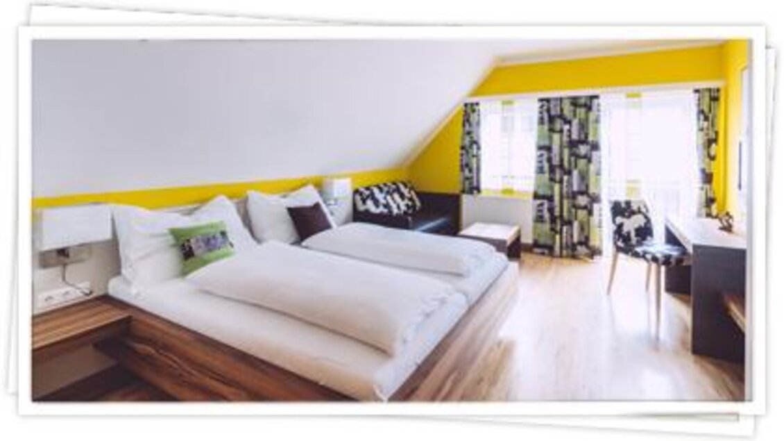 zu sehen ist ein Doppelbett im Zimmer. | © Kirchenwirt Fischbach