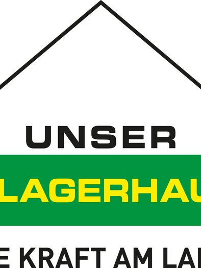 A simple logo with a house roof. It features the words "OUR WAREHOUSE" and "THE POWER IN THE COUNTRY" in yellow and black on a green background. | © Lagerhaus