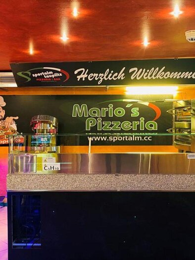 An inviting reception area of Mario's Pizzeria. The decor is modern with a friendly atmosphere. | © Mario Seebacher