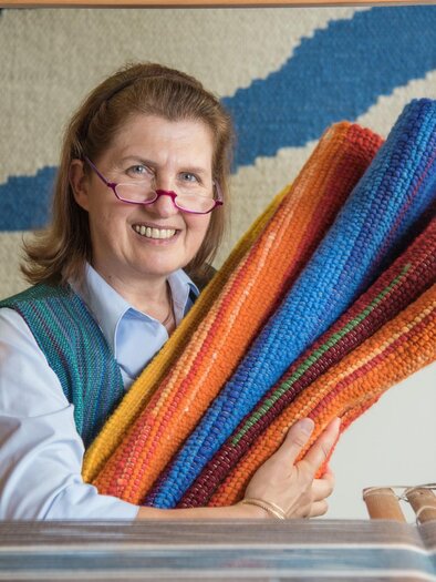 Fr. Strunz mit Teppichen | © Weberei Strunz