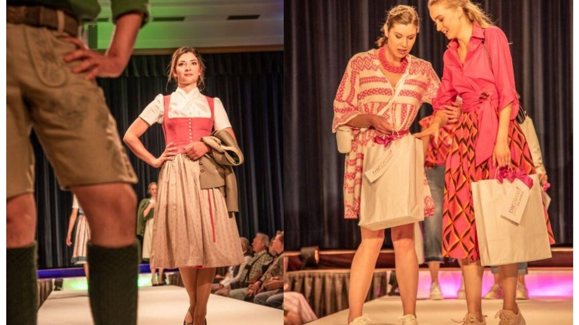 Eine Modenschau mit traditionellen und modernen Trachten. Zwei Frauen auf dem Laufsteg präsentieren elegante Outfits. | © www.narzissenfest.at/Sams