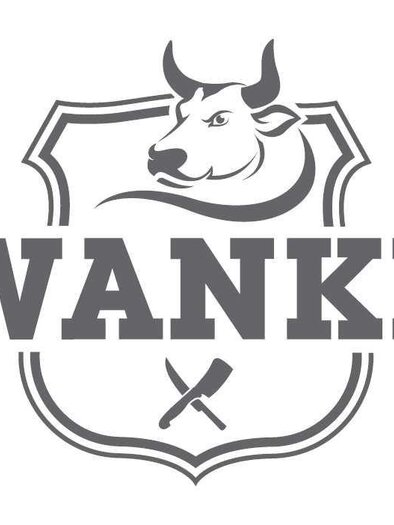 Logo of the butcher shop "WANKE" featuring a stylized bull's head, inscription, and crossed butcher tools in a coat of arms shield. | © Fleischhauerei - Imbissstube Wanke